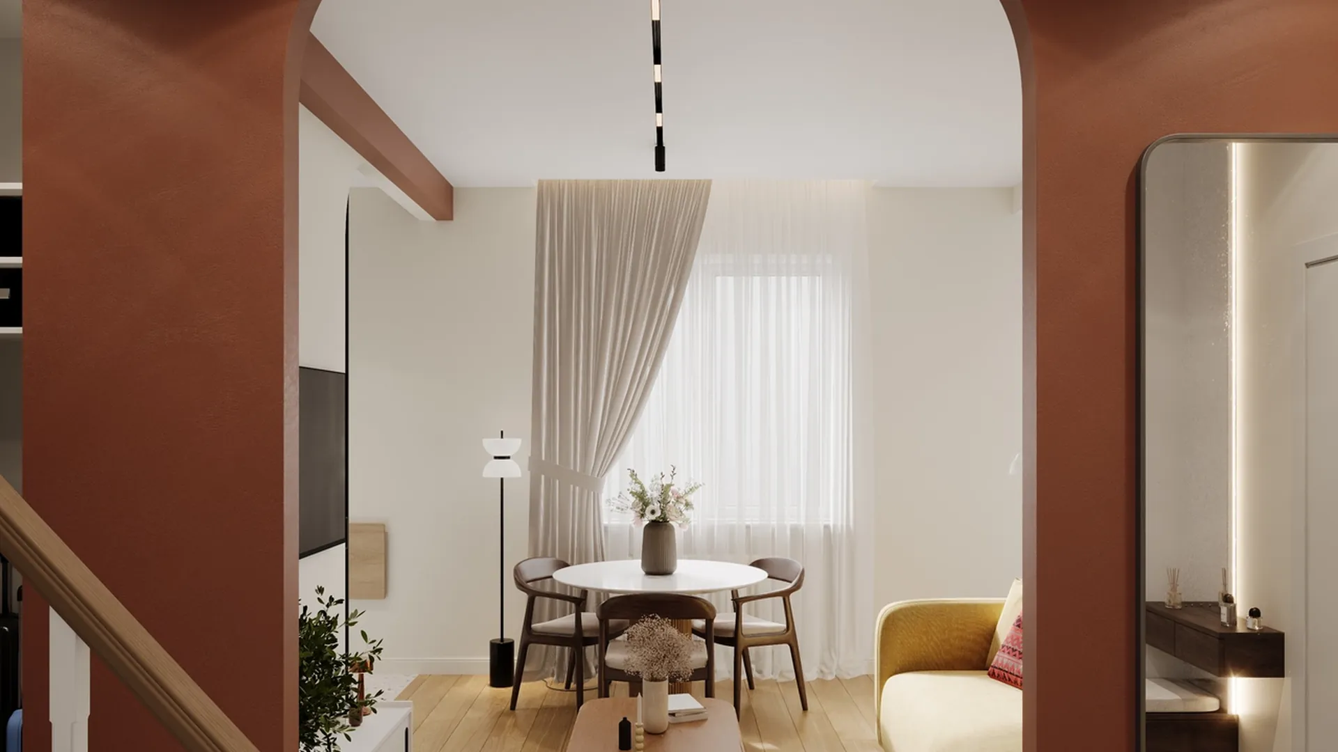 Living area seen through the terracotta arch, with a round table and a mustard armchair, Cuerno project, Chisinau