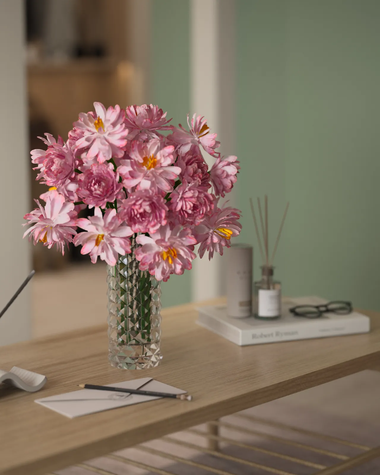 A vase filled with pink flowers on a wooden table, with a few decorative items in the background.