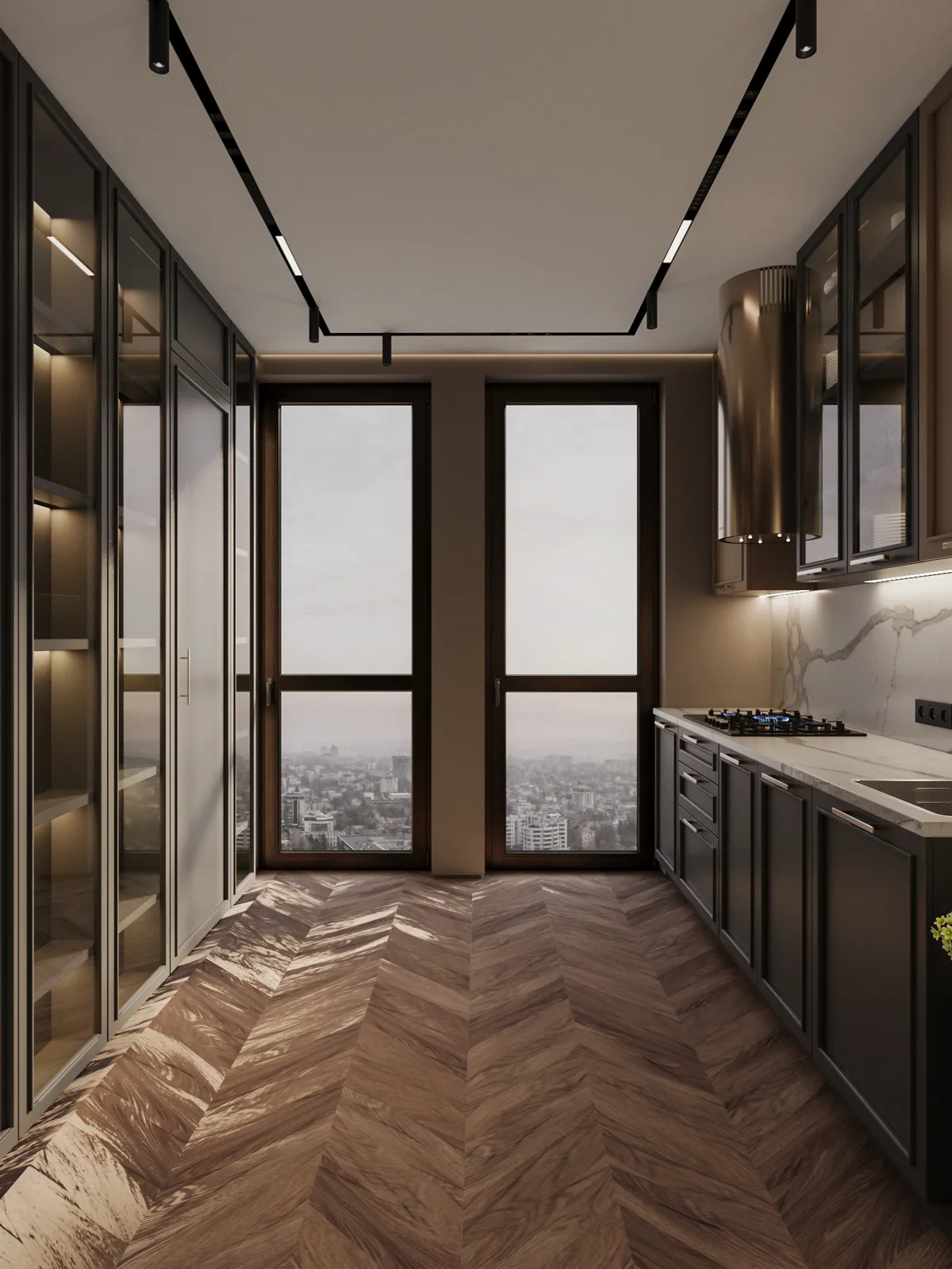 Narrow modern kitchen featuring dark cabinetry, chevron wood flooring, and two tall windows overlooking a cityscape.