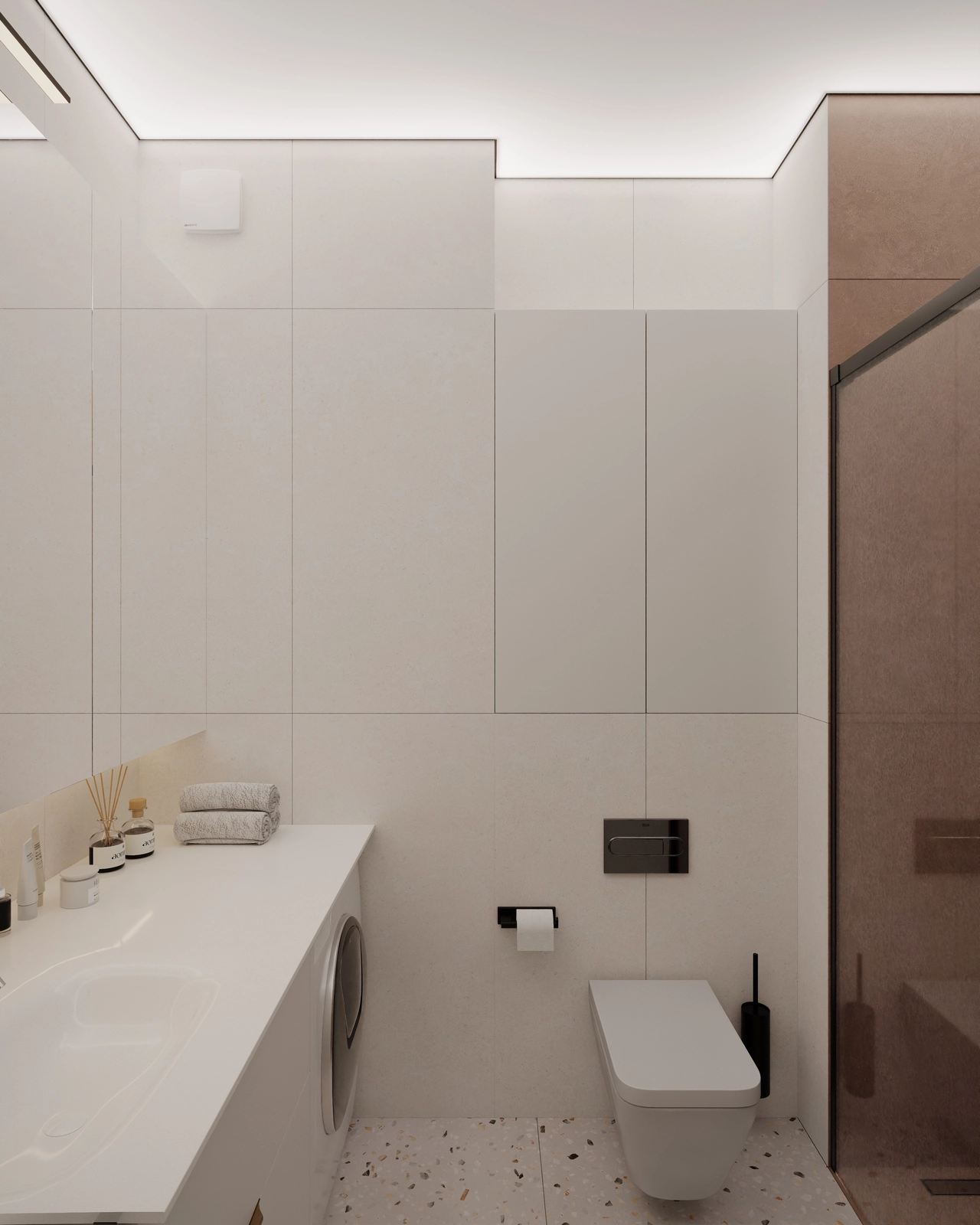 O baie modernă, cu un design minimalist, cu pereți albi, o toaletă elegantă și o cabină de duș din sticlă.