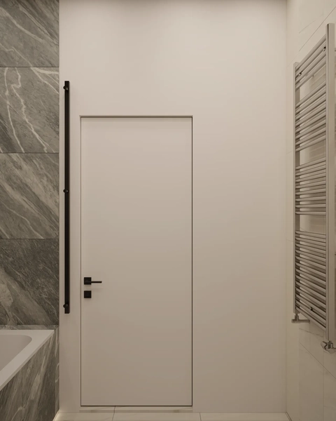 A minimalist bathroom interior featuring a plain white door and a towel radiator on the wall, with gray marble tiles.
