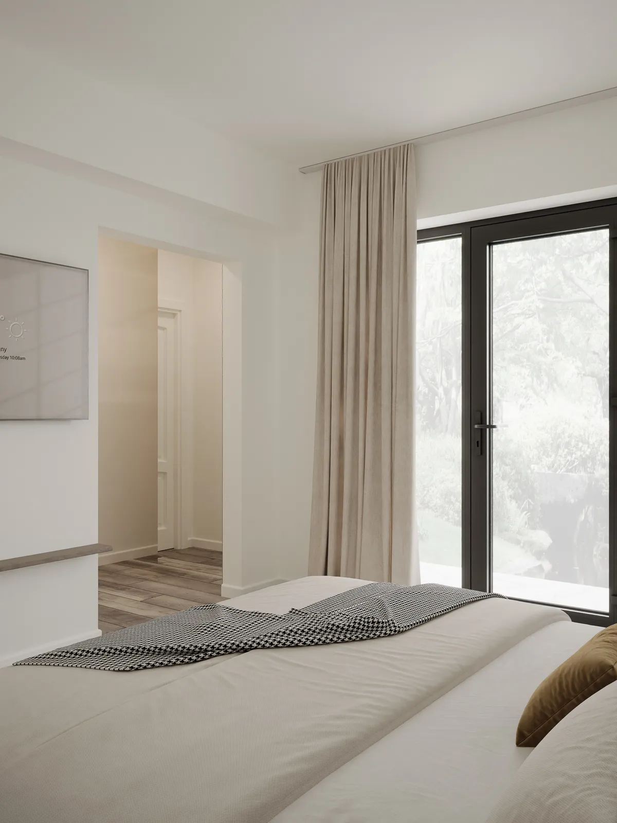 A modern bedroom featuring a large bed with neutral bedding, a decorative throw, and a curtain covering a window. The room has minimal decor and light-colored walls, creating an airy atmosphere. A doorway leads to another room in the background.