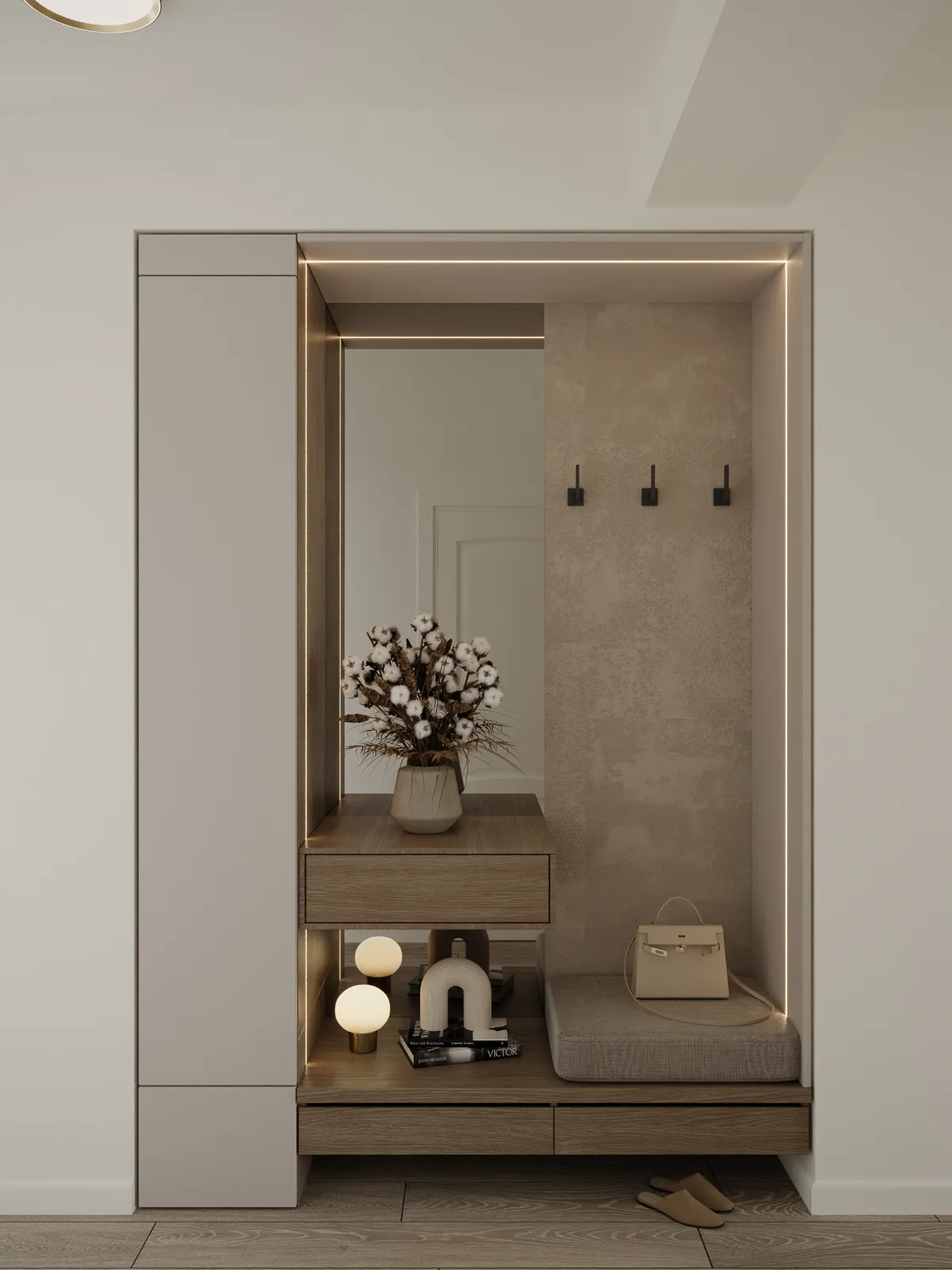 A modern entryway featuring a minimalist design with neutral tones. There is a small bench, decorative vase with flowers, and hooks on the wall. The space has built-in cabinetry and soft lighting.