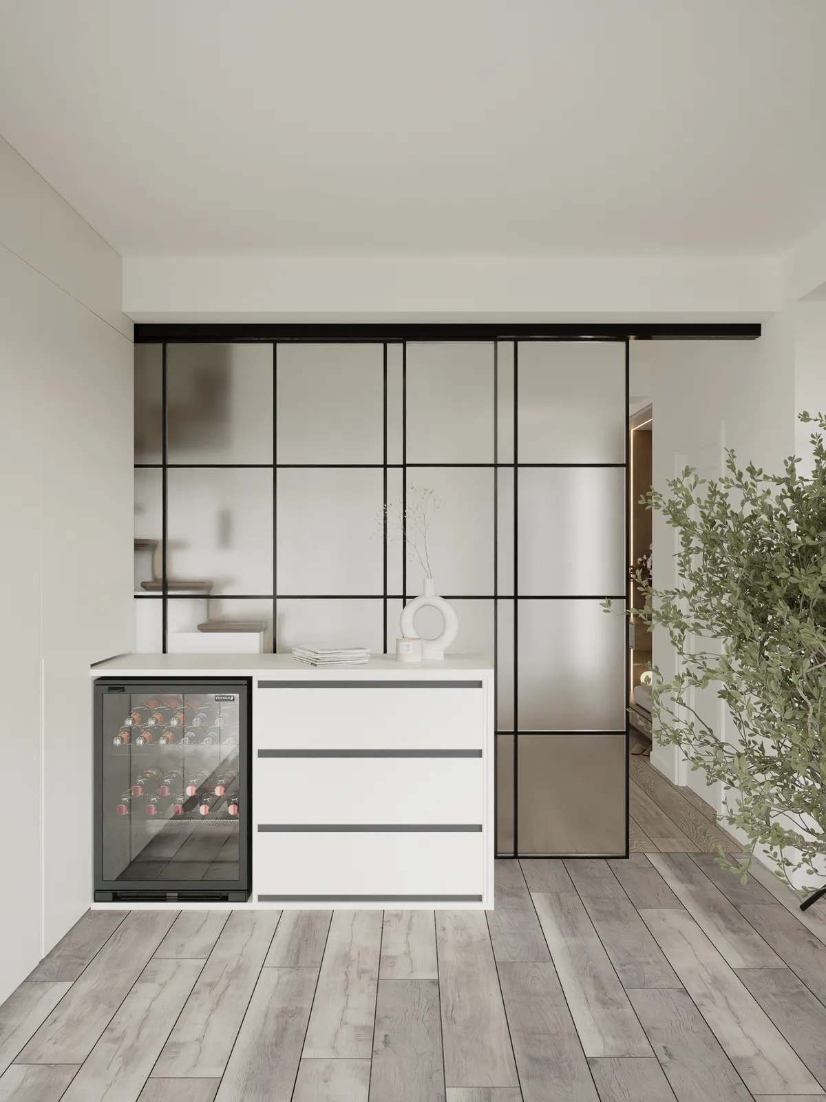 Minimalist interior featuring a white cabinet with an integrated wine cooler set against a black-framed, frosted glass sliding partition and light wood flooring.